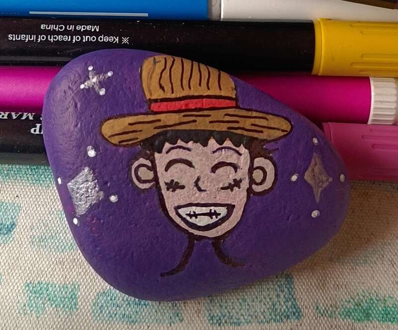Sasso dipinto: Rufy di One piece 🥰✨ — di Francesca